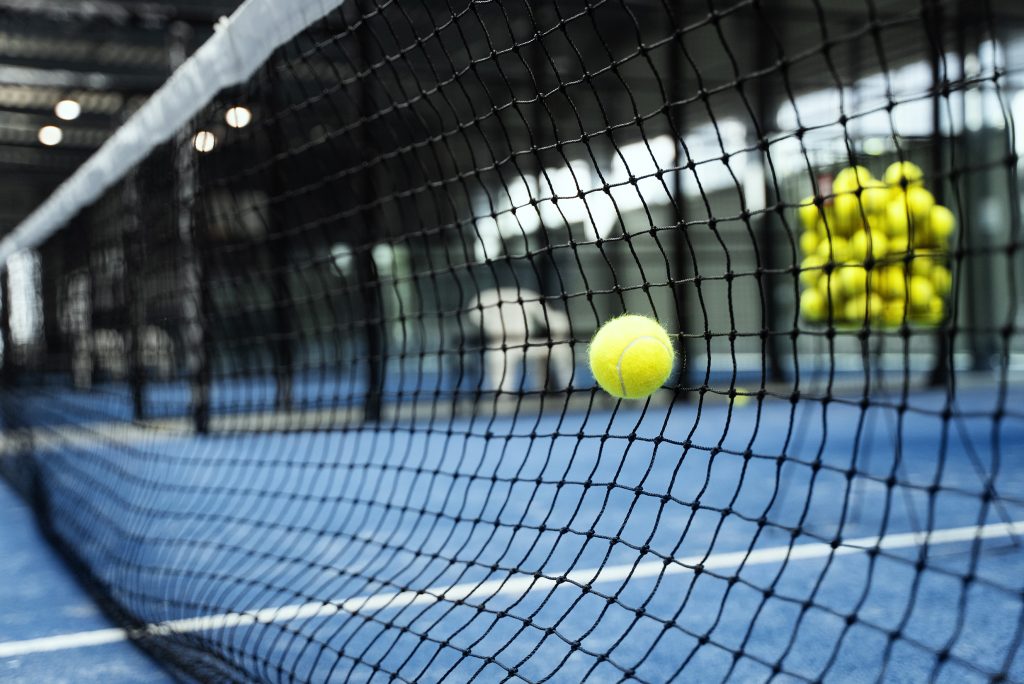 paddle tennis ball hitting net